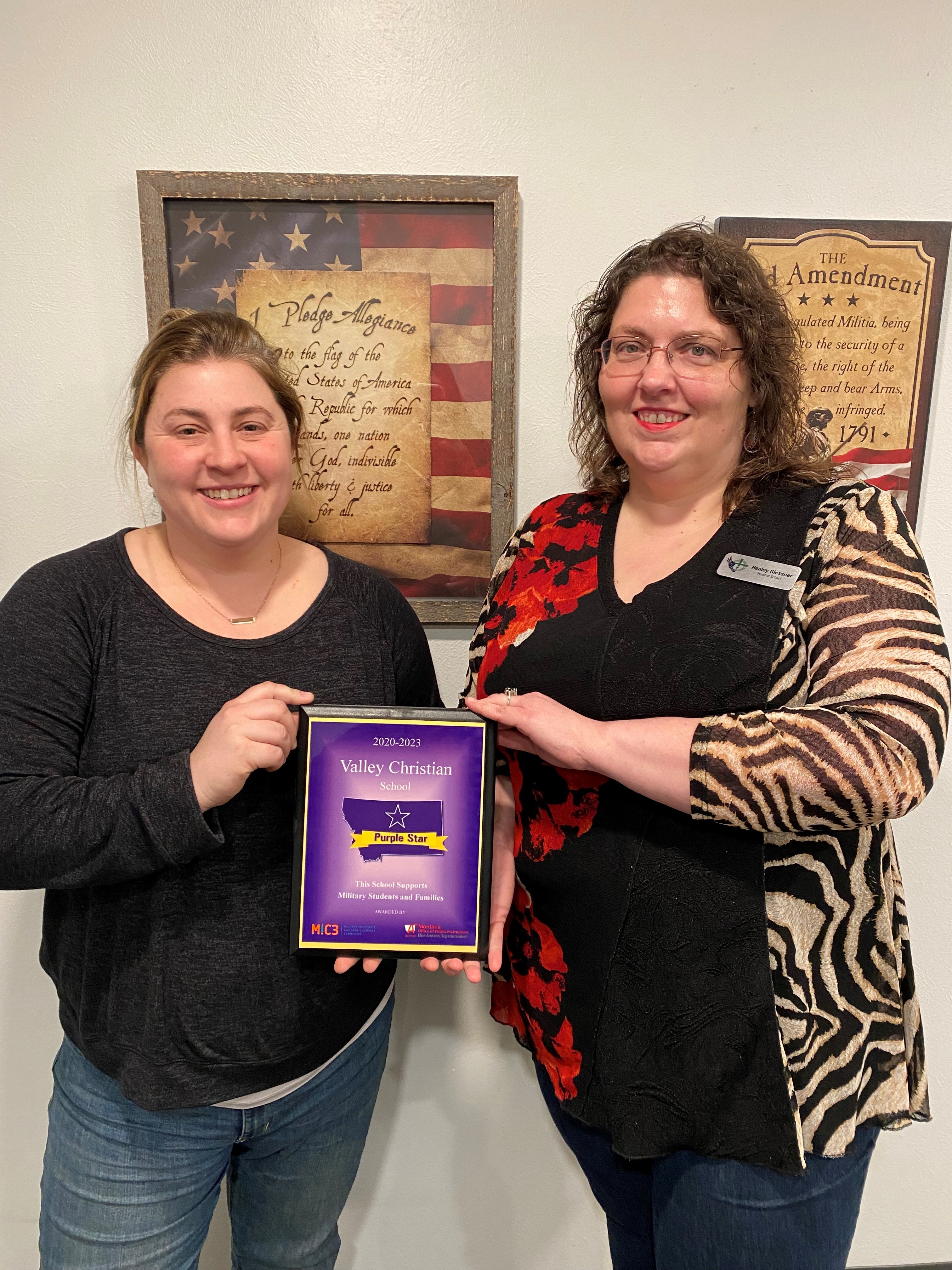 Staff and students from Valley Christian in Missoula with their Purple Star School award